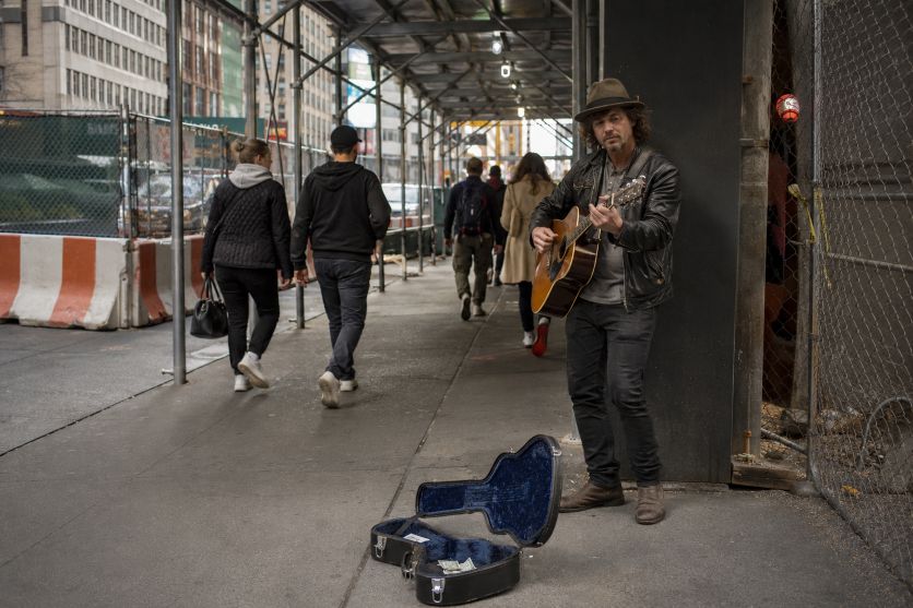 Manhattan Street Guitarist by Protected Walkway